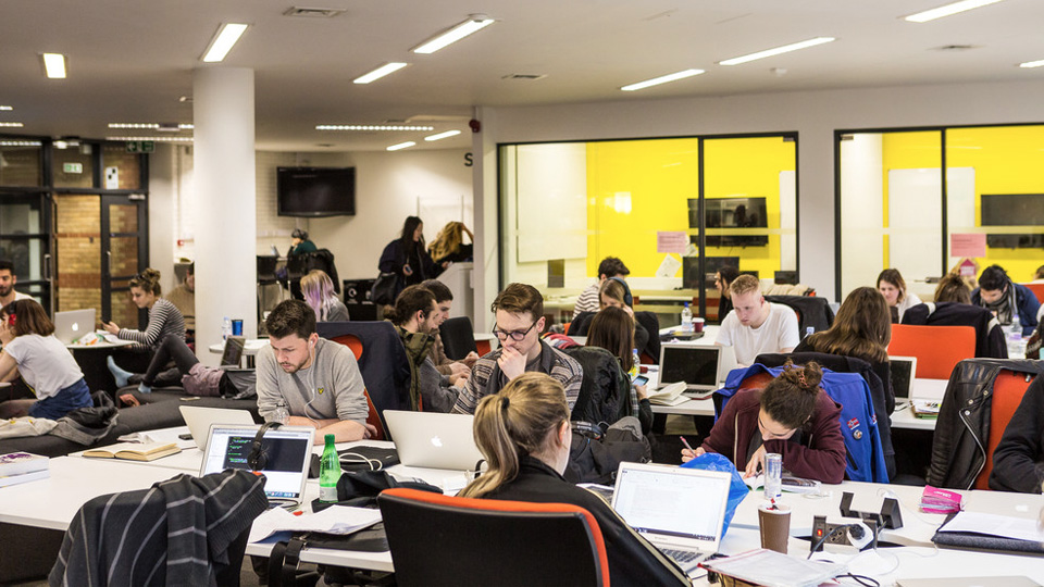 Open plan workspace at the back of the Library