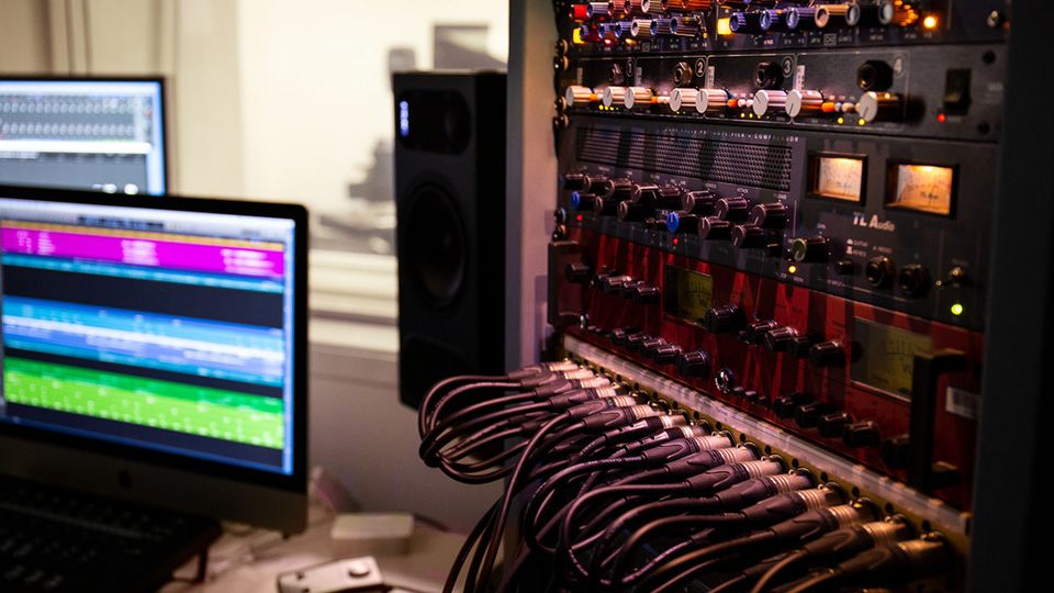 Rack mounted audio processing units in Goldsmiths studio space