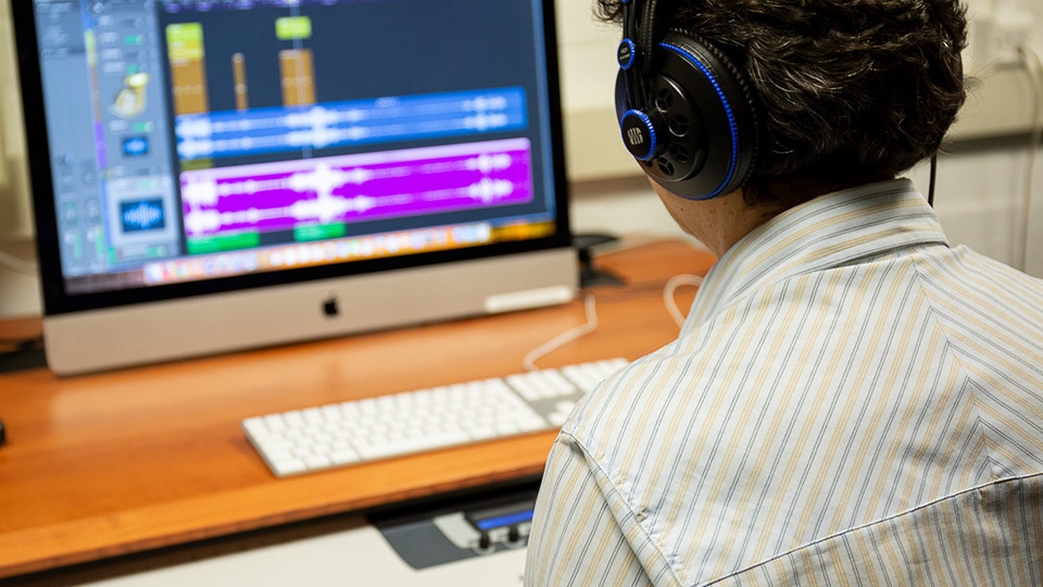 A student working in Logic Pro