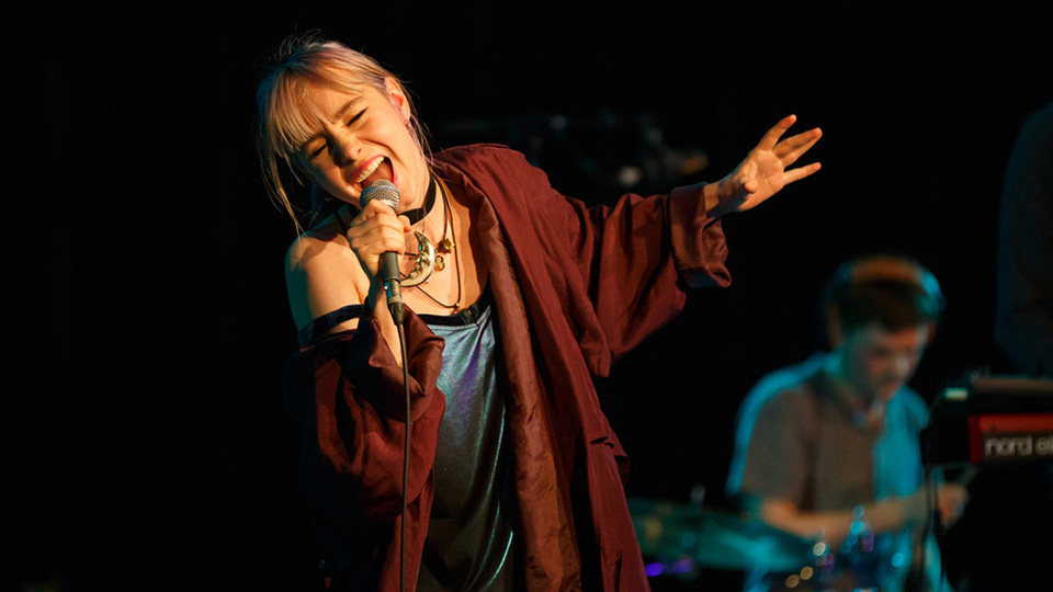 Students singing live out of the studio