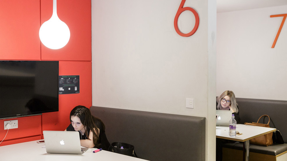 Each study booth in the refectory has power outlets and a TV
