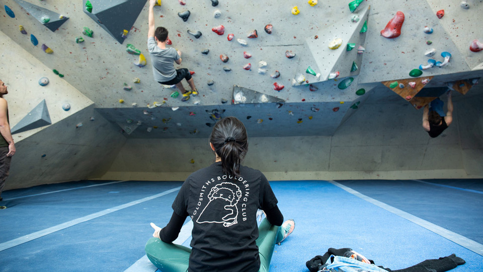 Goldsmiths Bouldering club mid-climb