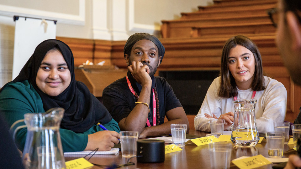 Students participating in a mock trial in the Council Chamber