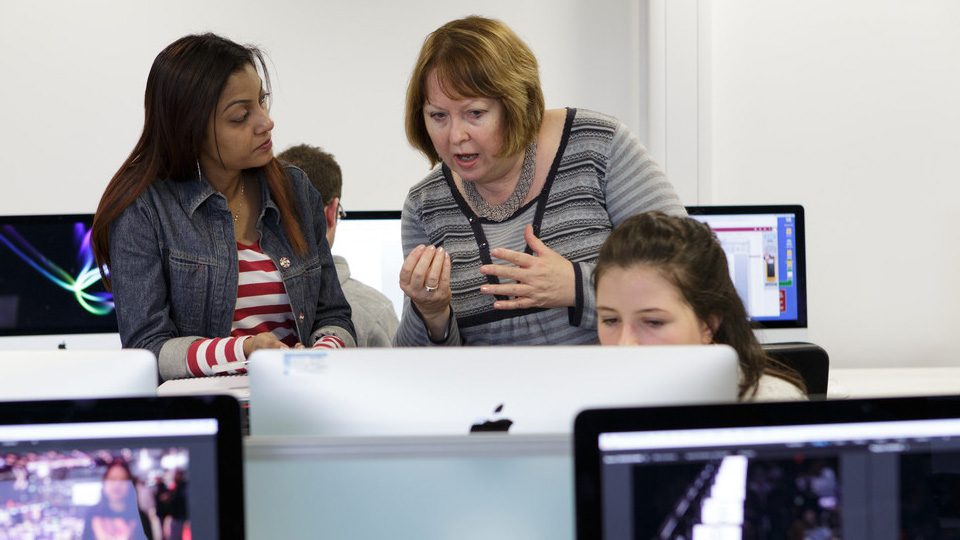 Journalism students working in Professor Stuart Hall Building computer lab